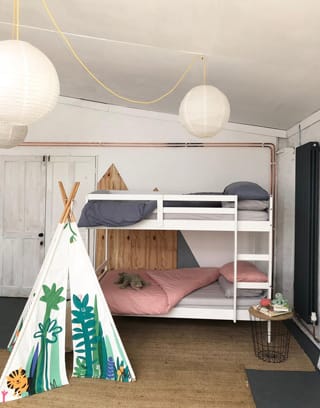 bedroom two bunk bed and toy teepee